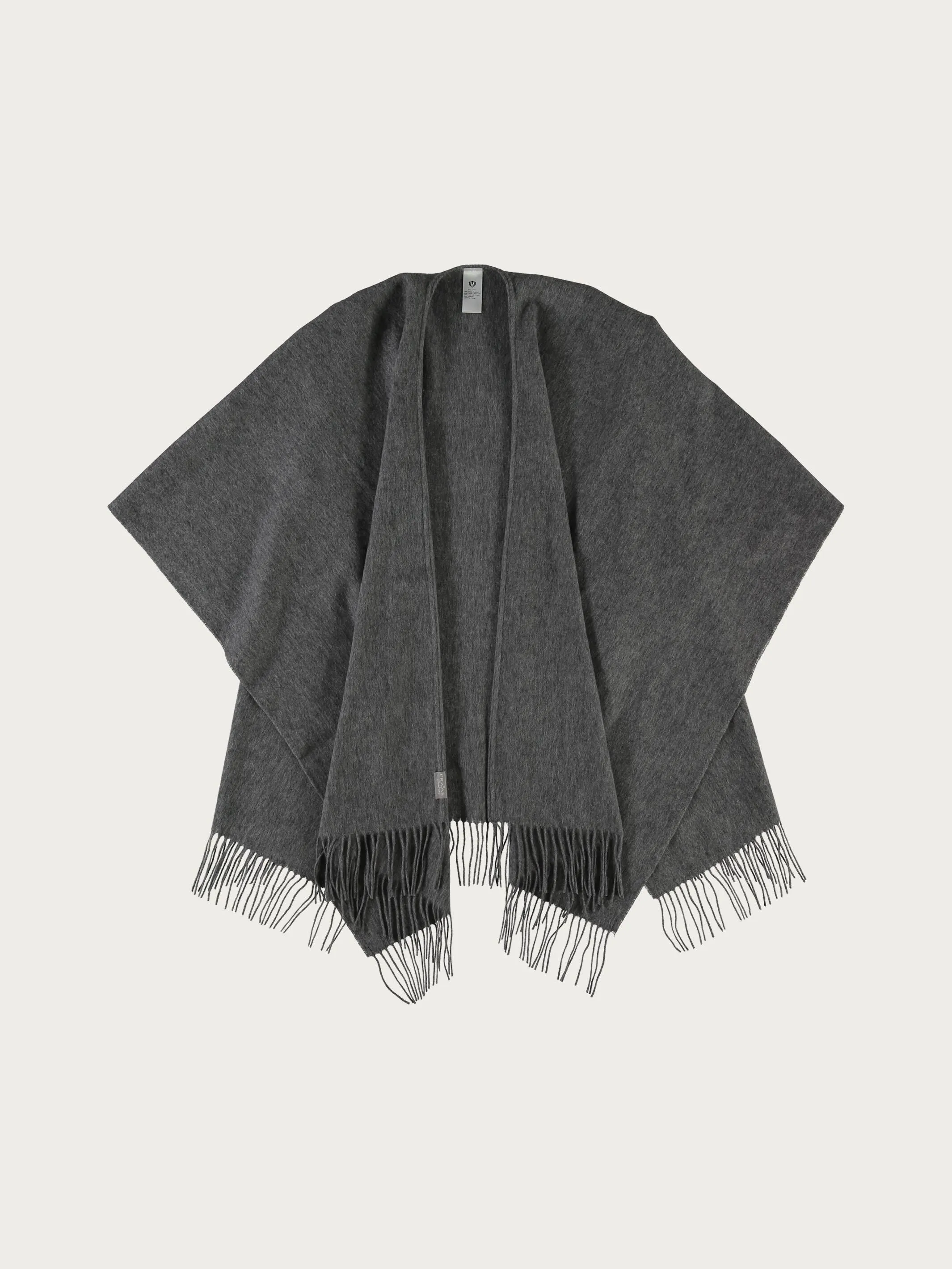 Einfarbiger Poncho aus reiner Wolle