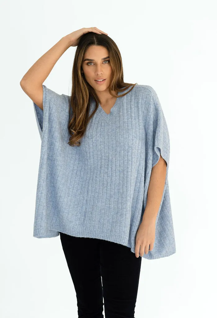 The Melina Poncho in Charcoal and Blue Mist by Humidity. A fabulous layering piece!
